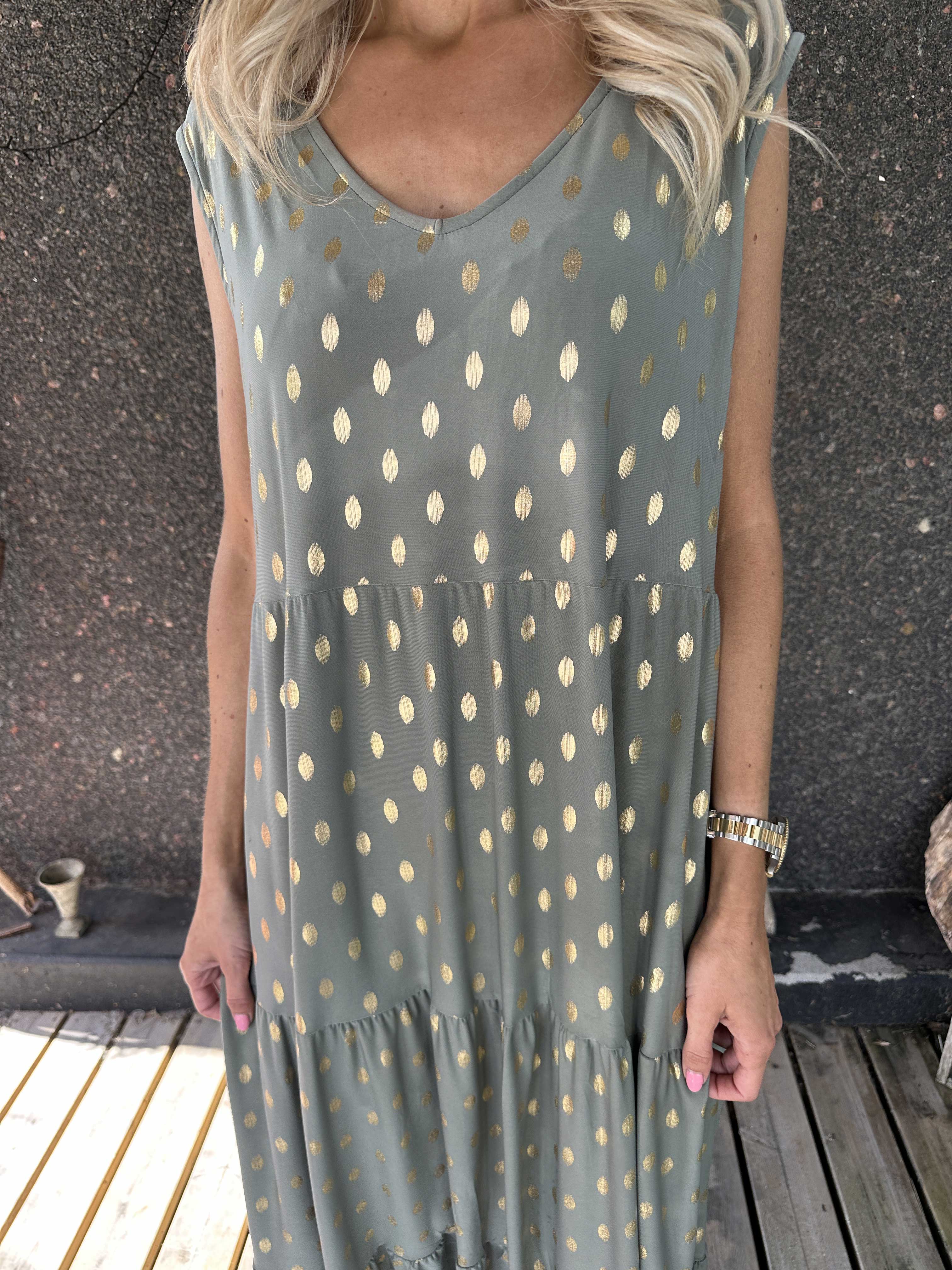 Karini Gold - Lang elastisk kjole med guld dutter